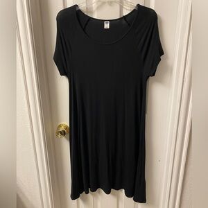 Scoop neck black dress Knee length.